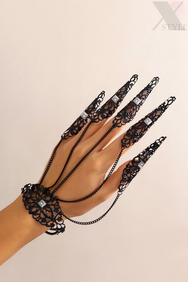 Filigree bracelet with claws and rhinestones