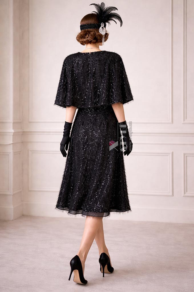 Вечернее платье с шалью, пайетками и бахромой