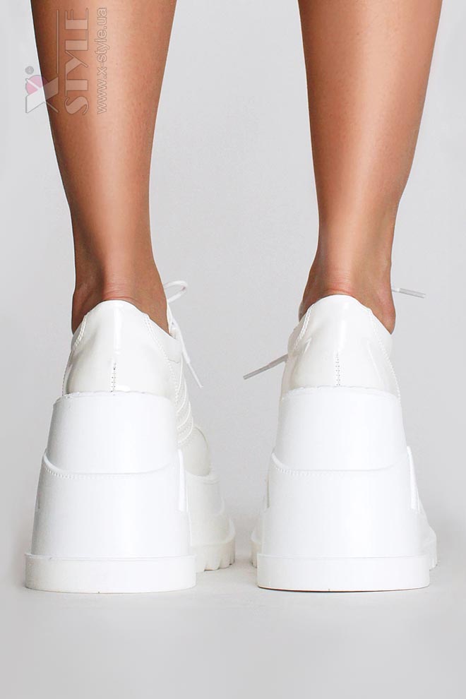 Белые кроссовки на высокой платформе Demonia